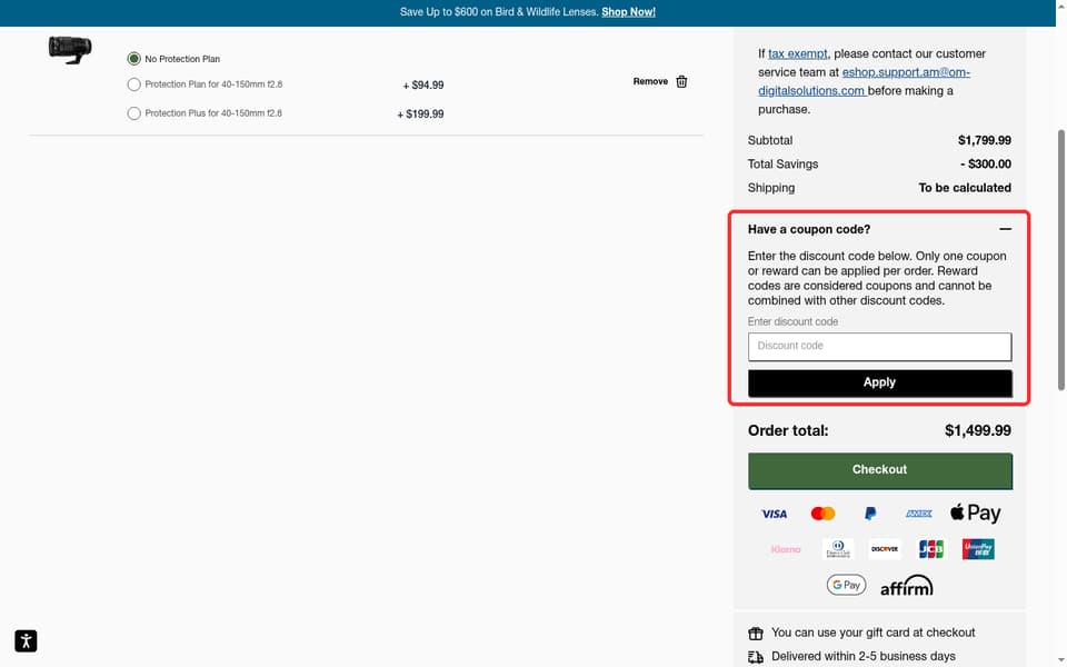 OM SYSTEM checkout page showing the Discount code field and Apply button