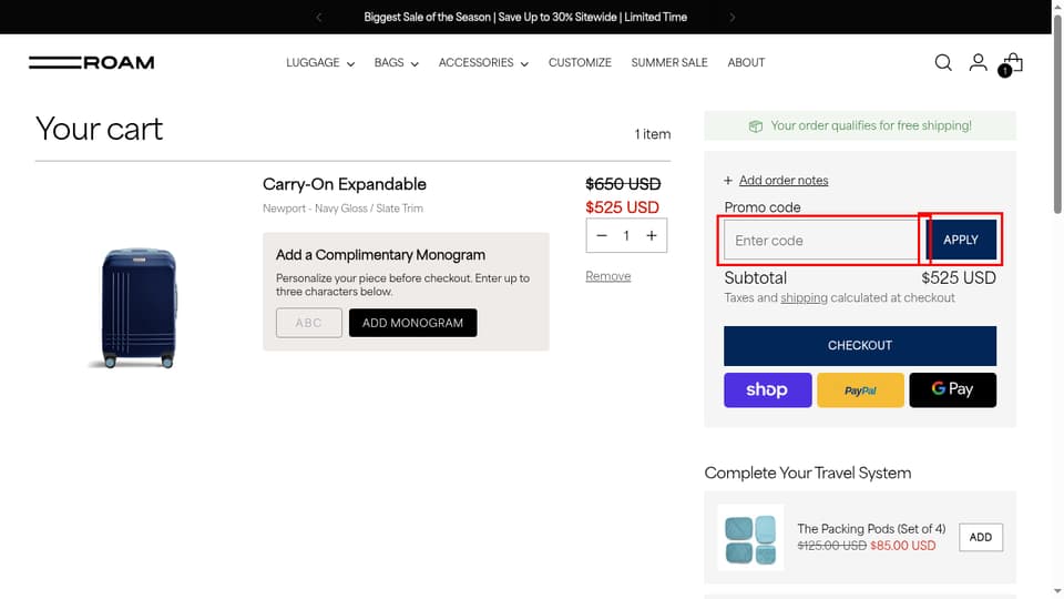 ROAM Luggage checkout page showing the Enter code field and Apply button